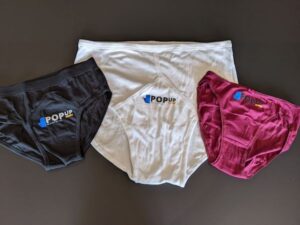 3 pairs of underpants with the PopUp logo on the front